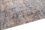 Nowoczesny dywan Rustic Beige z abstrakcyjnym wzorem w odcieniach beżu, brązu i szarości o postarzanym wykończeniu.